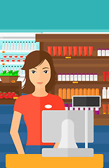 Image showing Saleslady standing at checkout.