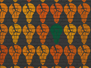 Image showing Business concept: light bulb icon on wall background