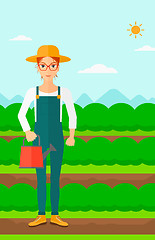 Image showing Farmer with watering can.