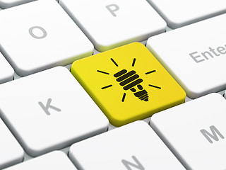 Image showing Business concept: Energy Saving Lamp on computer keyboard background