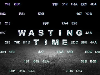 Image showing Time concept: Wasting Time in grunge dark room