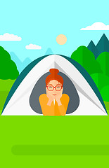 Image showing Woman lying in tent.