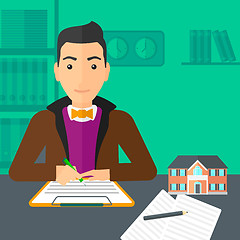 Image showing Real estate agent signing contract.