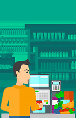 Image showing Cashier at supermarket checkout.