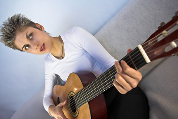 Image showing woman and guitar