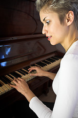 Image showing woman and piano