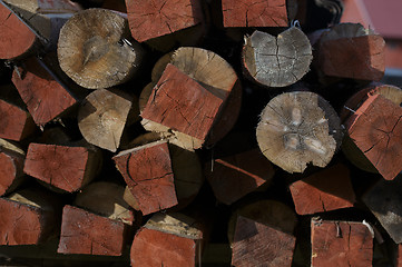 Image showing Structure of red stacked wood boards.