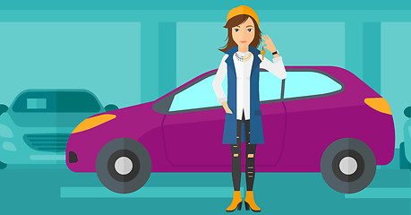 Image showing Woman holding keys from new car.