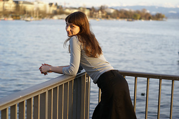 Image showing smiling girl at the bridge