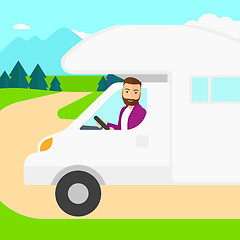 Image showing Man driving motor home.