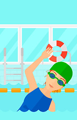 Image showing Swimmer training in pool.