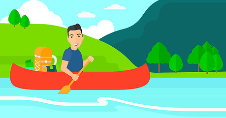 Image showing Man canoeing on the river.