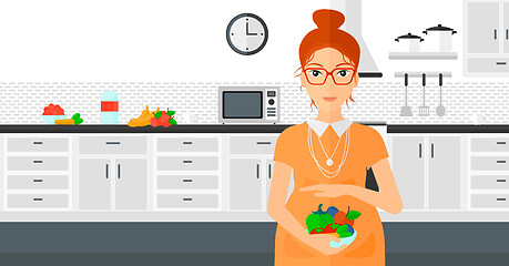 Image showing Pregnant woman with vegetables.