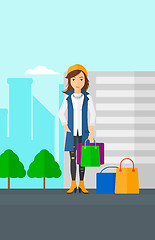 Image showing Buyer with shopping bags.