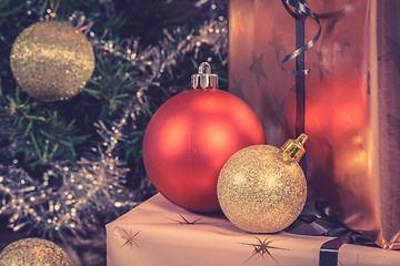 Image showing Shiny Christmas baubles with presents