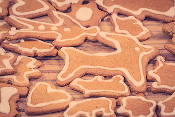 Image showing Xmas cookie figures on wood