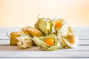 Image showing Physalis peruviana berries on a table