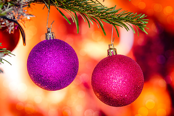 Image showing Christmas baubles in violet colors