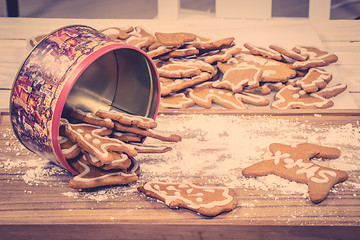 Image showing Xmas cookies in a cake tin