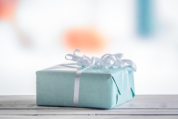 Image showing Blue present on a wooden table