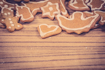 Image showing Christmas cookies on a wooden background