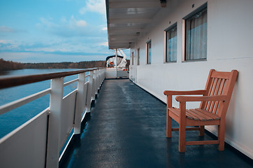 Image showing Wooden chairs on the deck of cruise liner