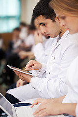 Image showing Medical students with modern devices on the lecture