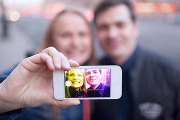 Image showing Happy couple taking self portrait