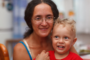 Image showing Forty years old mother with her son