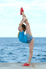 Image showing Girl stretching out outdoor