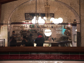 Image showing Cafe Interior Reflecting in the Mirror