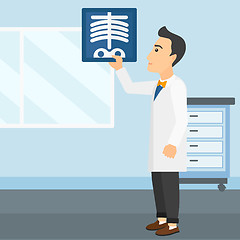 Image showing Doctor examining radiograph.