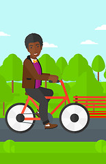 Image showing Man riding bicycle.