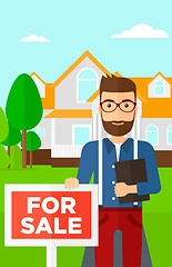 Image showing Real estate agent offering house.