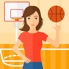 Image showing Basketball player spinning ball.