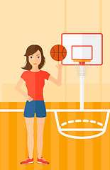 Image showing Basketball player spinning ball.