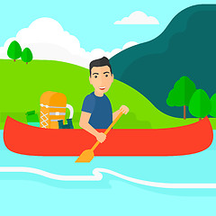 Image showing Man canoeing on the river.