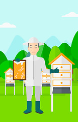 Image showing Bee-keeper at apiary.