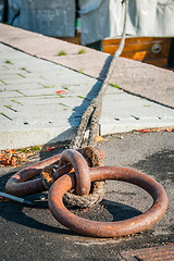 Image showing Ship anchored to a post