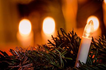 Image showing Electric Christmas light on a tree