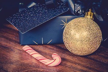 Image showing Xmas presents and a sugar cane