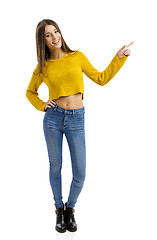 Image showing Happy girl pointing