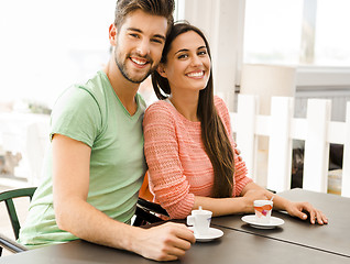 Image showing Young couple drinking coffee