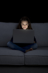 Image showing Little girl working with a laptop