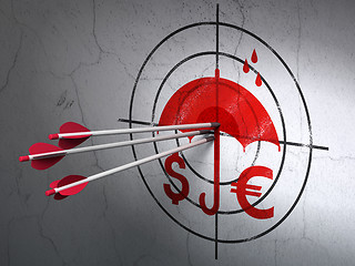 Image showing Protection concept: arrows in Money And Umbrella target on wall background