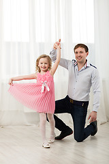 Image showing Little princess dancing with father