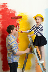 Image showing Family fun during wall painting