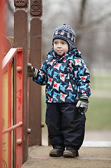 Image showing Cute little boy dressed in trendy winter clothes