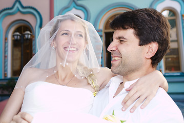 Image showing Happy laughing bride and groom