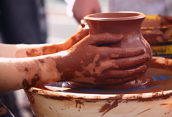 Image showing Potter making the pot in traditional style.